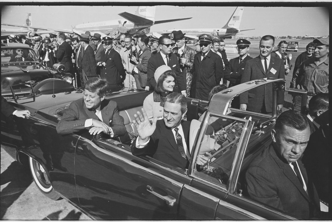 Kennedy rides through Dallas on November 22, 1963.