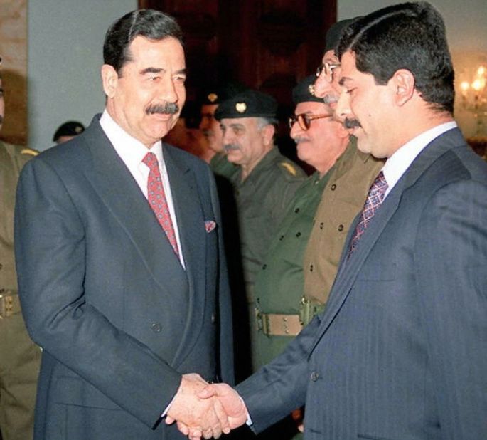 Former Iraqi President Saddam Hussein and his son Qusay in 1997. All of Iraq's presidents before and since have also had mustaches, as did Nasser and Sadat of Egypt (and the kings and sultans before them), Turkey's Erdogan (and two preceding prime ministers), and Syria's Assad (and his father).