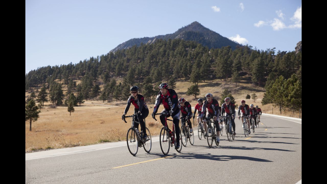 Strode leads a group of cyclists in Boulder, Colorado.