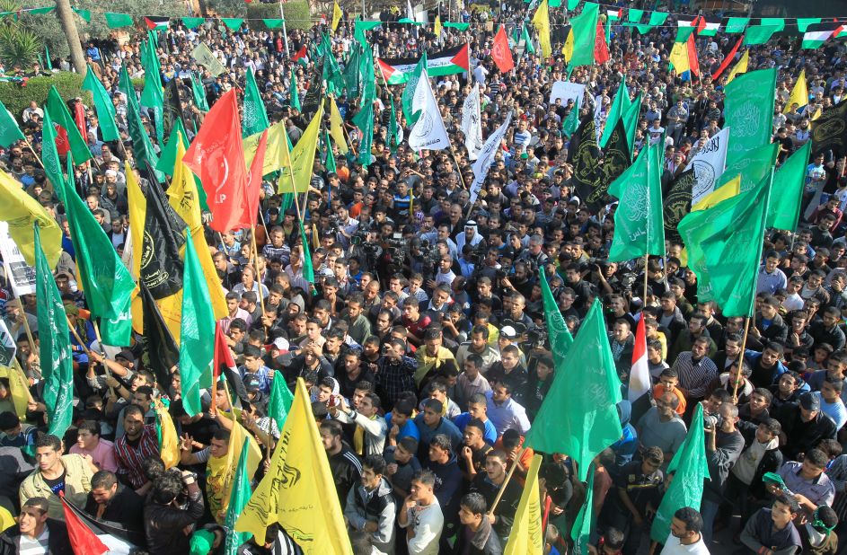 Palestinians gather to listen to Hamas Prime Minister Ismail Haniyeh speak Thursday in Gaza City. Supporters of Hamas and its moderate rival Palestinian party Fatah displayed rare unity in celebrating the cease-fire.