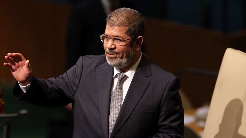 Egyptian President Mohamed Morsy walks to the podium for his address to world leaders at the United Nations General Assembly on September 26, 2012 in New York City.