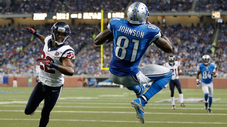 Johnson makes a touchdown catch in front of the Texans' Ball.