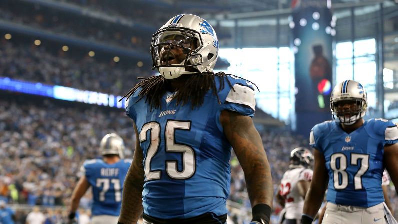 Mikel Leshoure of the Detroit Lions celebrates after scoring on a two-yard run in the first quarter against the Houston Texans.