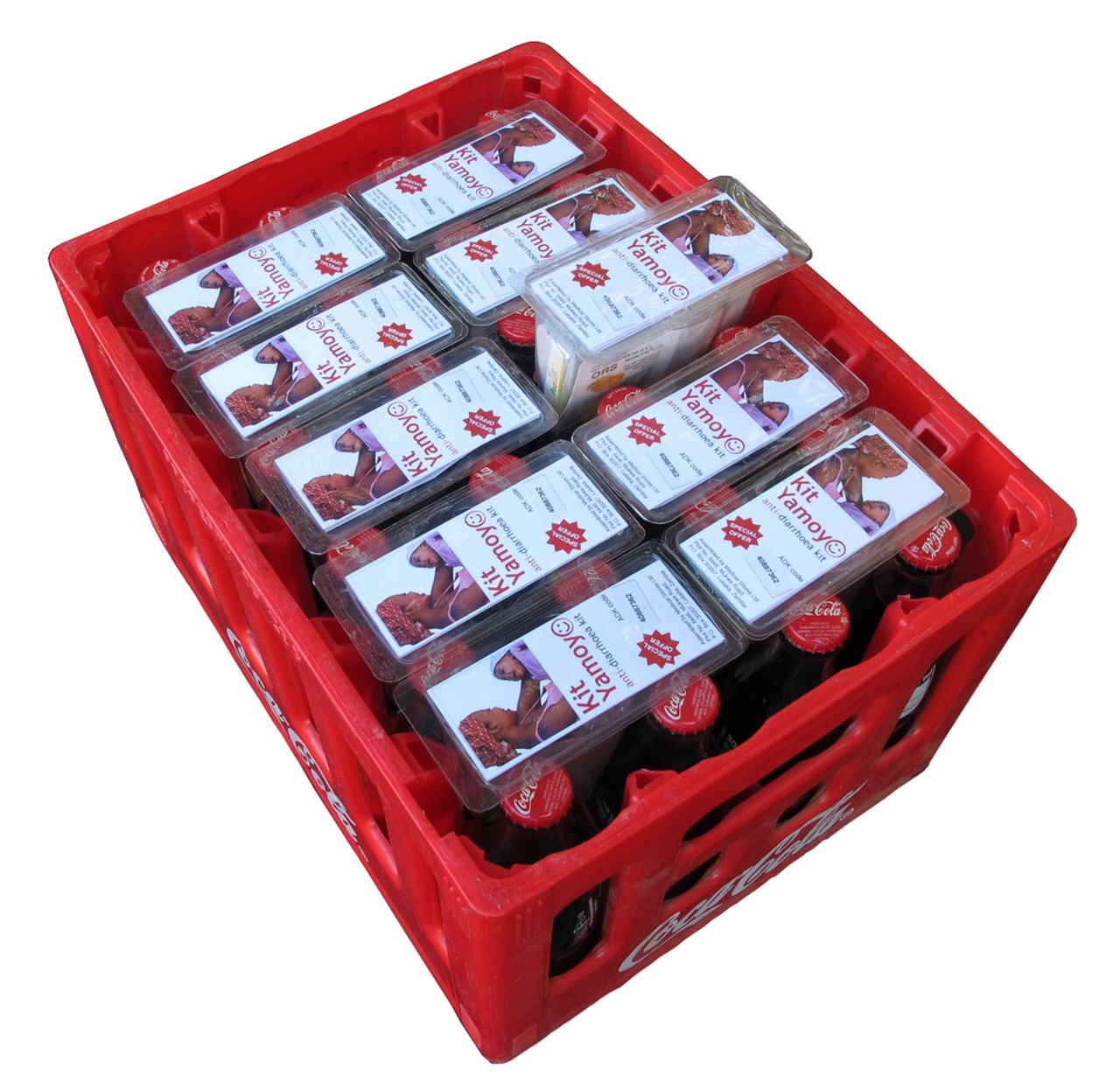 Ten packages of "Kit Yamoyo" anti-diarrhea kits fit easily into a single crate of cola.