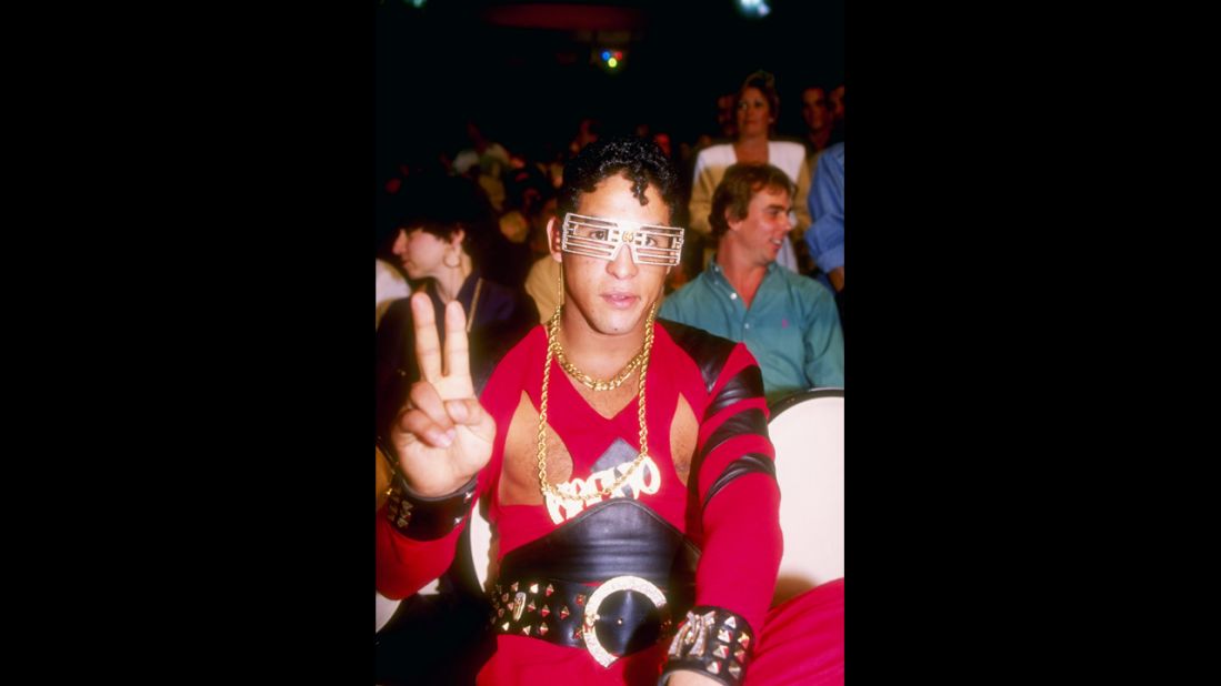 Camacho gives the peace sign while watching a 1991 bout between Julio Cesar Chavez and Lonnie Smith in Las Vegas. Camacho was considered a promoter's dream because he was a showman in the ring against some of the greatest fighters of his era.