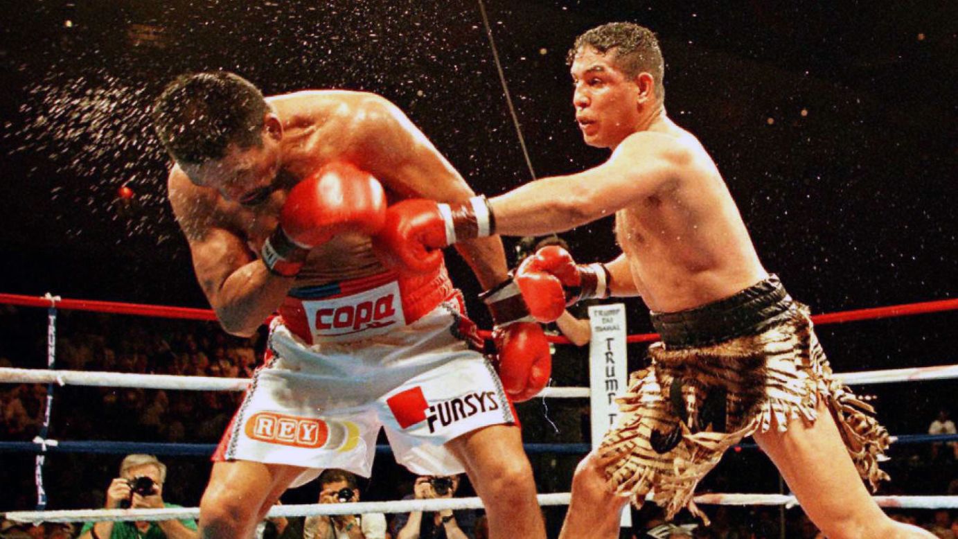 Camacho lands a punch to his opponent, Roberto Duran, during their IBC middleweight fight in Atlantic City, New Jersey, in 1996. Camacho won in a 12-round decision.