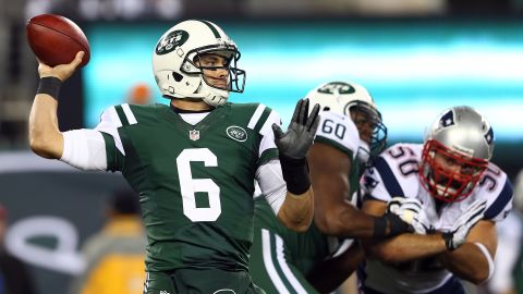 New York Jets quarterback Mark Sanchez drops back to pass in the second quarter against the New England Patriots.