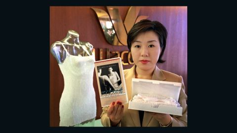 Chiaki Kobayashi, an employee of Japan's leading underwear maker Wacoal, displays 'cinema lingerie' packed in a video cassette tape case-- a gift to mark White Day, one of Japan's romantic holidays.