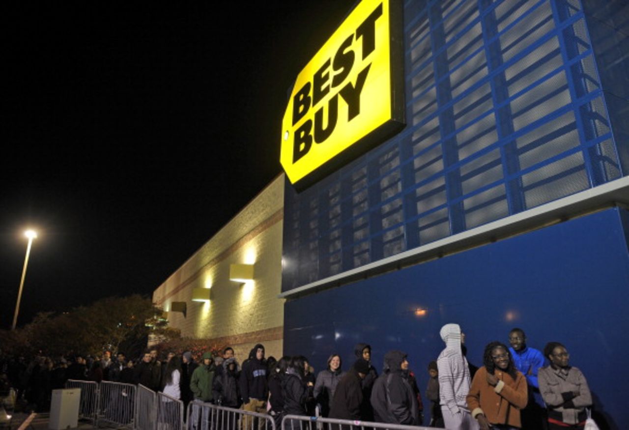 Shoppers queue outside of a Best Buy store during its Black Friday sale, which started at midnight on Friday in Rockville, Maryland.