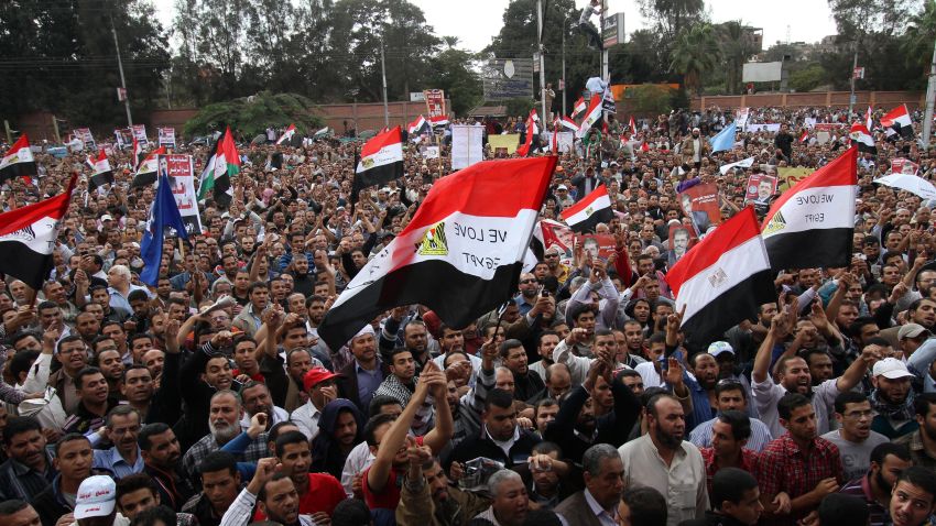 Thousands of supporters of Egyptian President Mohammed Morsy gather outside the presidential palace in Cairo on Friday.  Morsy insisted Egypt was on the path to "freedom and democracy," as protesters held rival rallies over sweeping powers he assumed that further polarised the country's political forces.