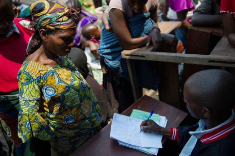 A displaced Congolese woman registers at a camp for displaced persons at Mugunga, 8km from the centre of Goma on November 22, 2012.
