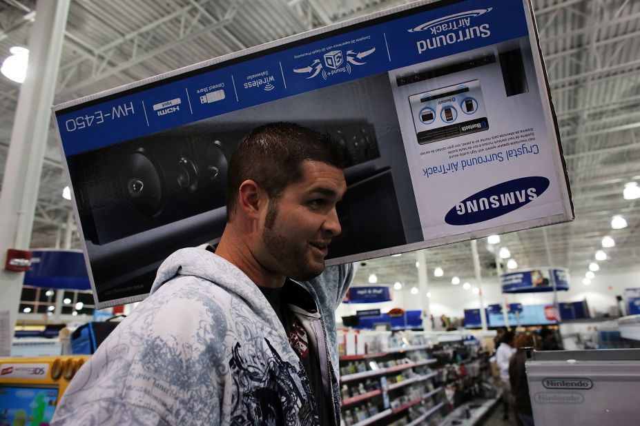 A shopper scores a Samsung sound bar at a Best Buy store in Naples, Florida.