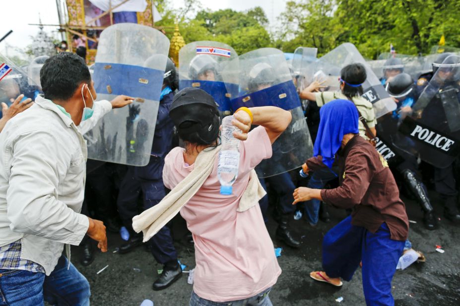 Protesters clash with riot poilce on Saturday.
