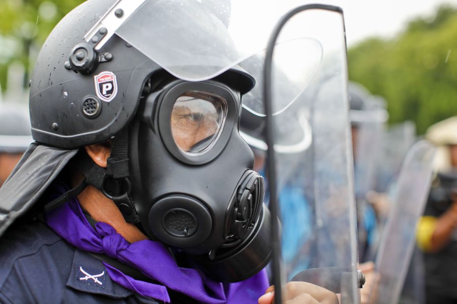 Thai riot police deploy against anti-government protesters on Saturday.