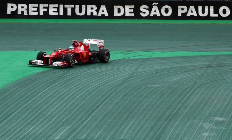  Alonso lost grip on the first turn of the circuit as tension soared during a pulsating race at Interlagos. The Ferrari man, who last won the title back in 2006, was hoping to collect his third championship trophy by sneaking past Vettel.