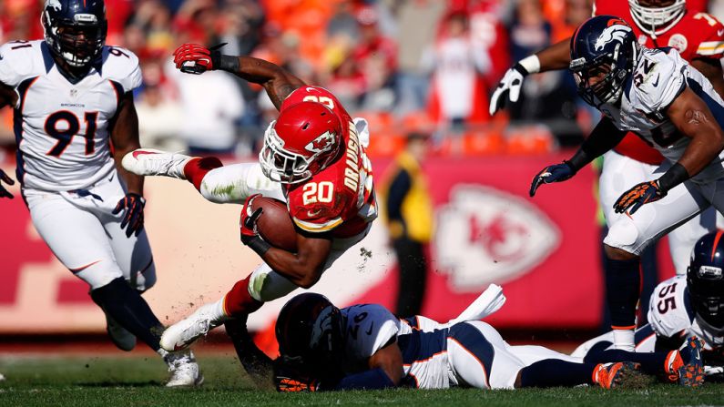 Running back Shaun Draughn of the Kansas City Chiefs carries the ball against the Denver Broncos at Arrowhead Stadium on Sunday in Kansas City, Missouri.