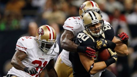 Jimmy Graham of the Saints is tackled by Patrick Willis of the 49ers on Sunday.