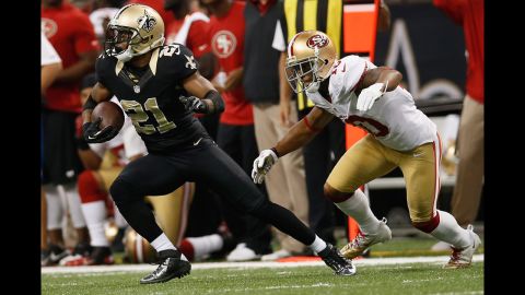 Patrick Robinson of the Saints intercepts a ball intended for Kyle Williams of the 49ers on Sunday.