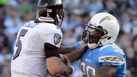 Antwan Barnes of the Chargers sacks Joe Flacco of the Ravens during the second quarter on Sunday.