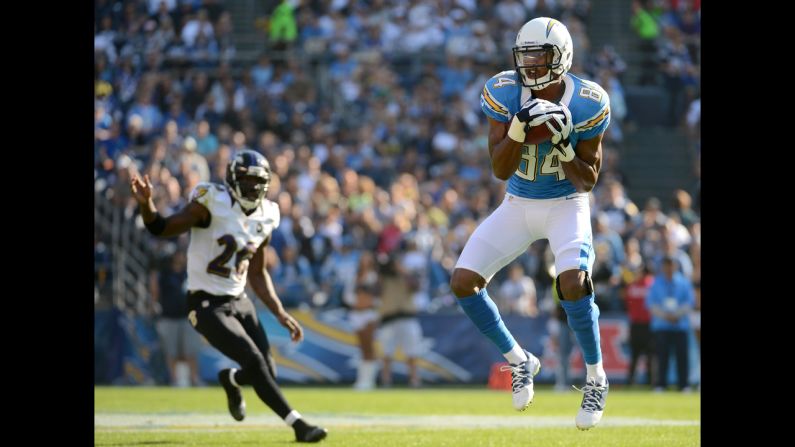 Danario Alexander of the Chargers makes a catch in front of safety Emanuel Cook of the Ravens on Sunday.