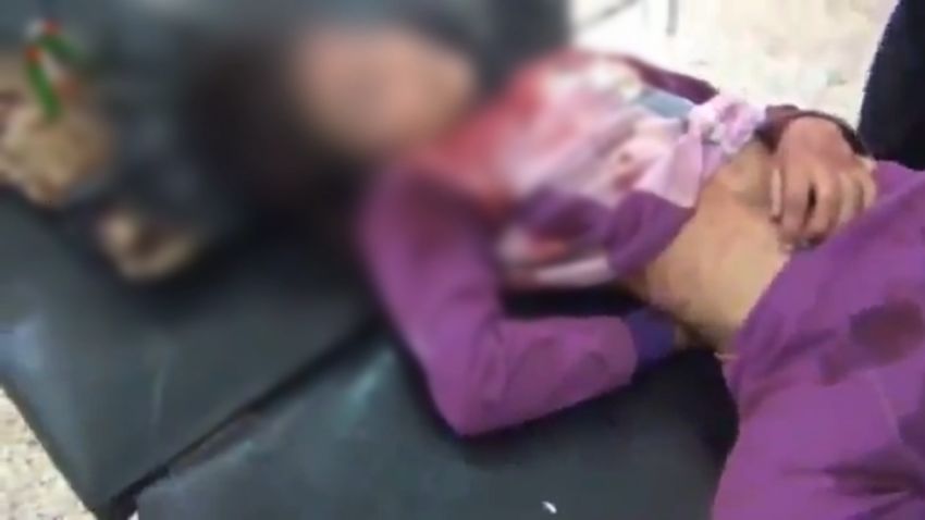 Still taken from amateur video from YouTube reportedly shows one of ten kids killed when government warplanes shelled a Damascus playground on November 25, 2012.