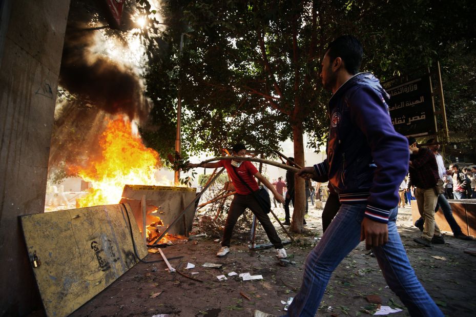 Protesters clash with Egyptian police at Simon Bolivar Square on Sunday, November 25, in Cairo. Egypt's powerful Muslim Brotherhood called nationwide demonstrations in support of Islamist President Mohamed Morsy in his showdown with the judges over the path to a new constitution.  