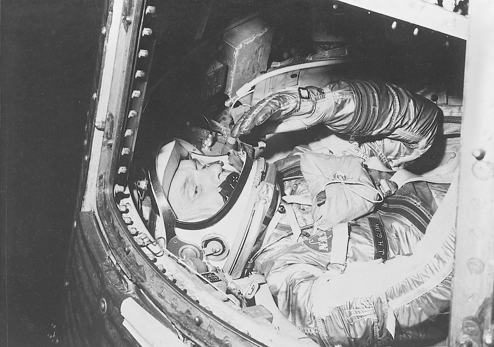 John Glenn, aboard the Friendship 7, became the first American to orbit the Earth on February 20, 1962. He also set a record as the oldest astronaut in space when, at the age of 77, he went on a mission aboard the Space Shuttle Discovery in 1996.