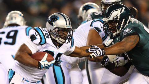 Jonathan Stewart of the Carolina Panthers carries the ball as Cullen Jenkins of the Philadelphia Eagles defends on Monday, November 26, at Lincoln Financial Field in Philadelphia. Check out the action from Week 12 of the NFL and <a href="http://www.cnn.com/2012/11/16/worldsport/gallery/nfl-week-11/index.html">look back at the best photos from Week 11</a>.