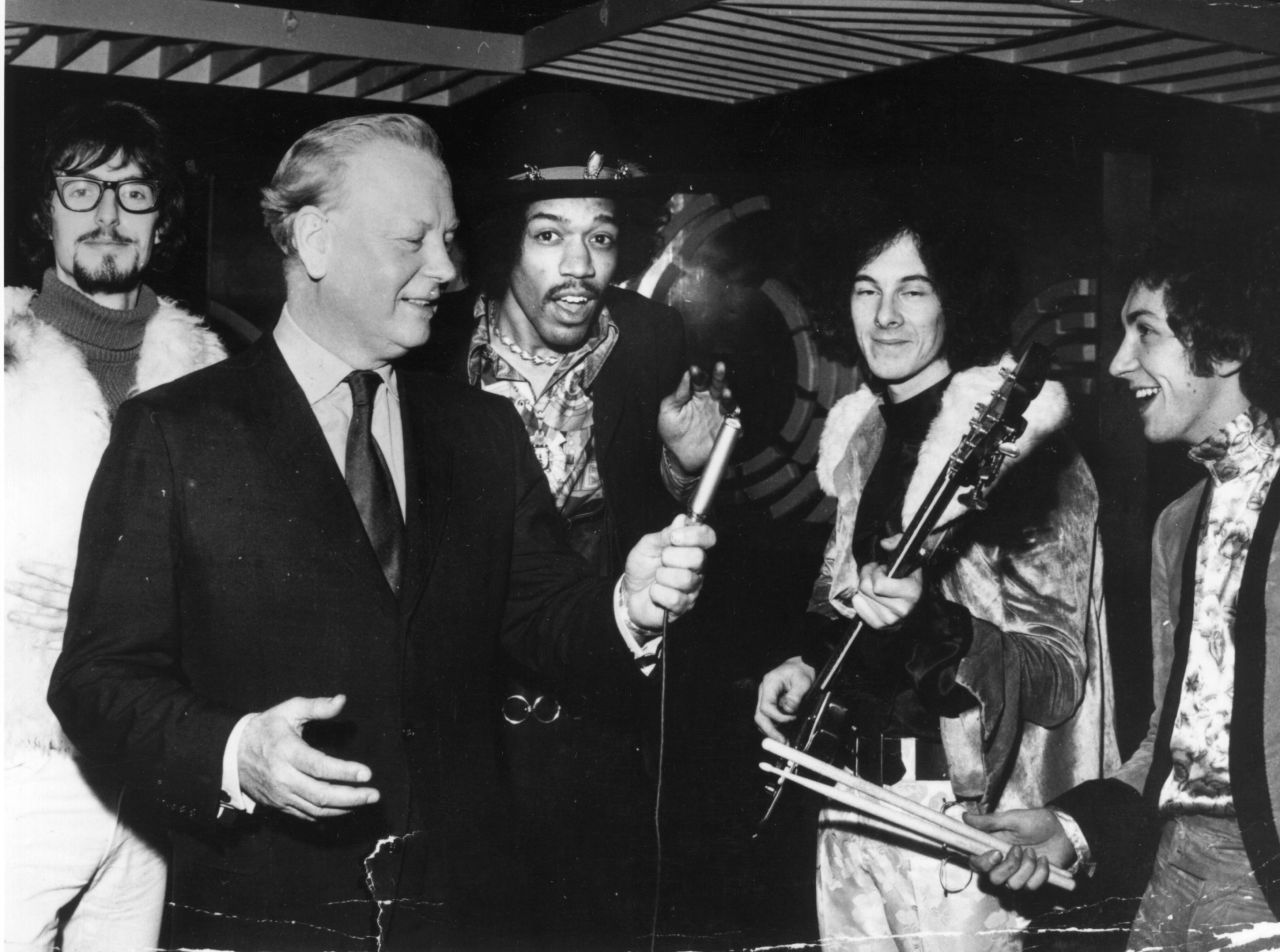 By 1967, Hendrix had gone to London and had formed The Jimi Hendrix Experience. Here, Hendrix is seen with bassist Noel Redding and drummer Mitch Mitchell, far right.