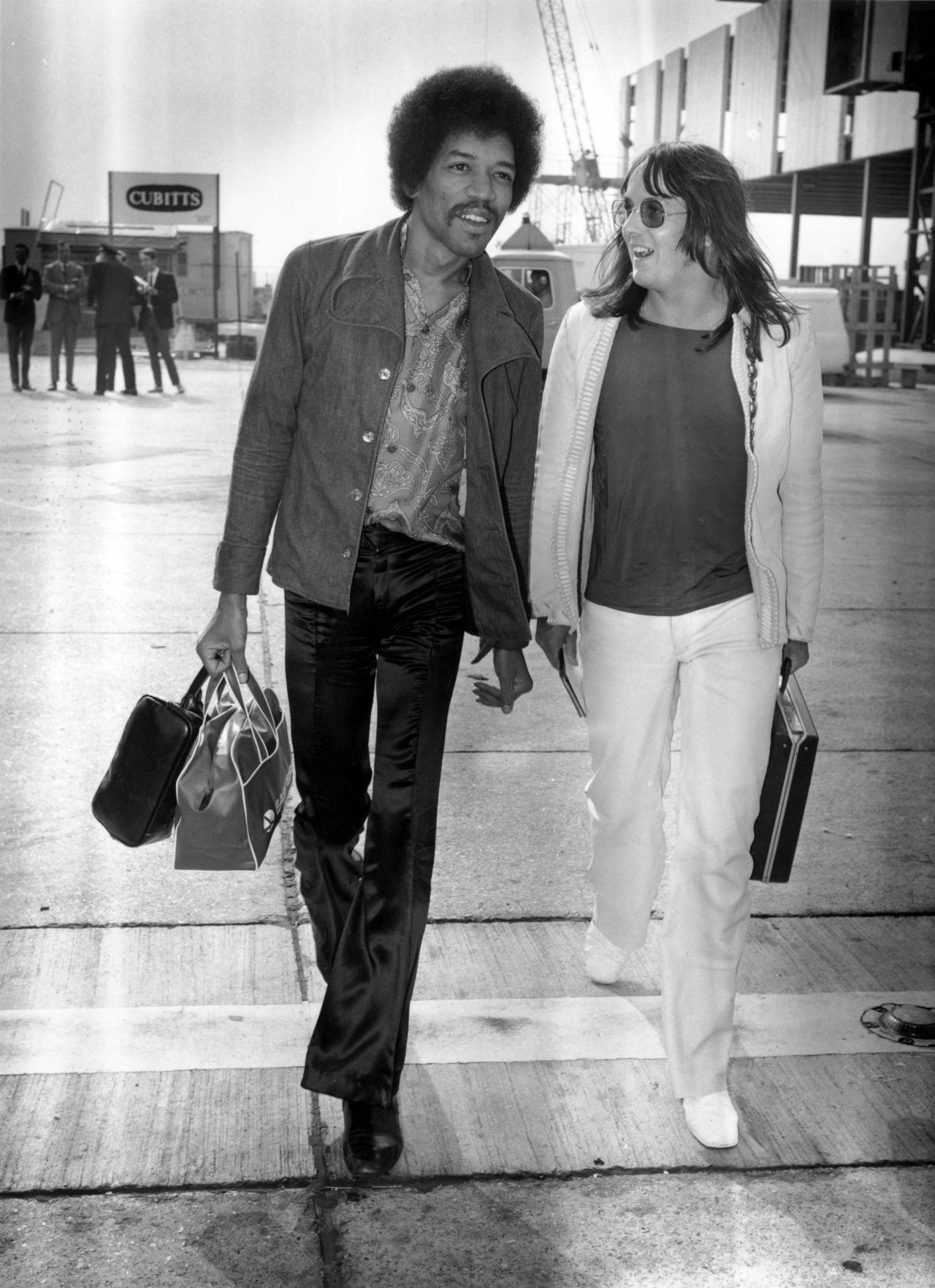 Here, Hendrix walks through the London Airport with Eric Barrett on September 2, 1970, 16 days before he died at the age of 27. His talent and contributions to both music and style have lived on, however, and musician Andre 3000 is lined up to portray Hendrix in a 2013 biopic, <a href="http://www.imdb.com/title/tt2402085/" target="_blank" target="_blank">"All Is By My Side."</a>