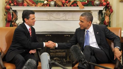 Mexican President Enrique Peña Nieto and U.S. President Barack Obama shake hands at a meeting in Washington last year.