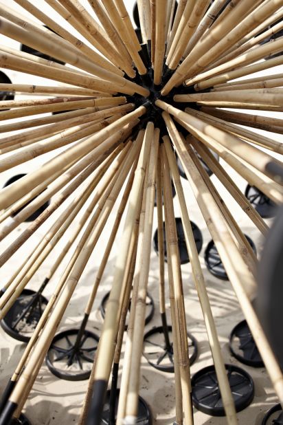 A multitude of plunger-like arms made from lightweight bamboo spread out from a spherical core that contains a cheap GPS tracking device. The Mine Kafon can withstand the loss of about a third of these arms before it can no longer propel itself forward by the wind. 