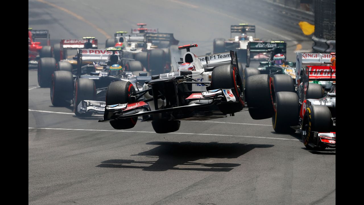 The car driven by Kamui Kobayashi of Japan flies through the air after crashing during the start of the Monaco Formula One Grand Prix at the Circuit de Monaco on May 27 in Monte Carlo, Monaco.
