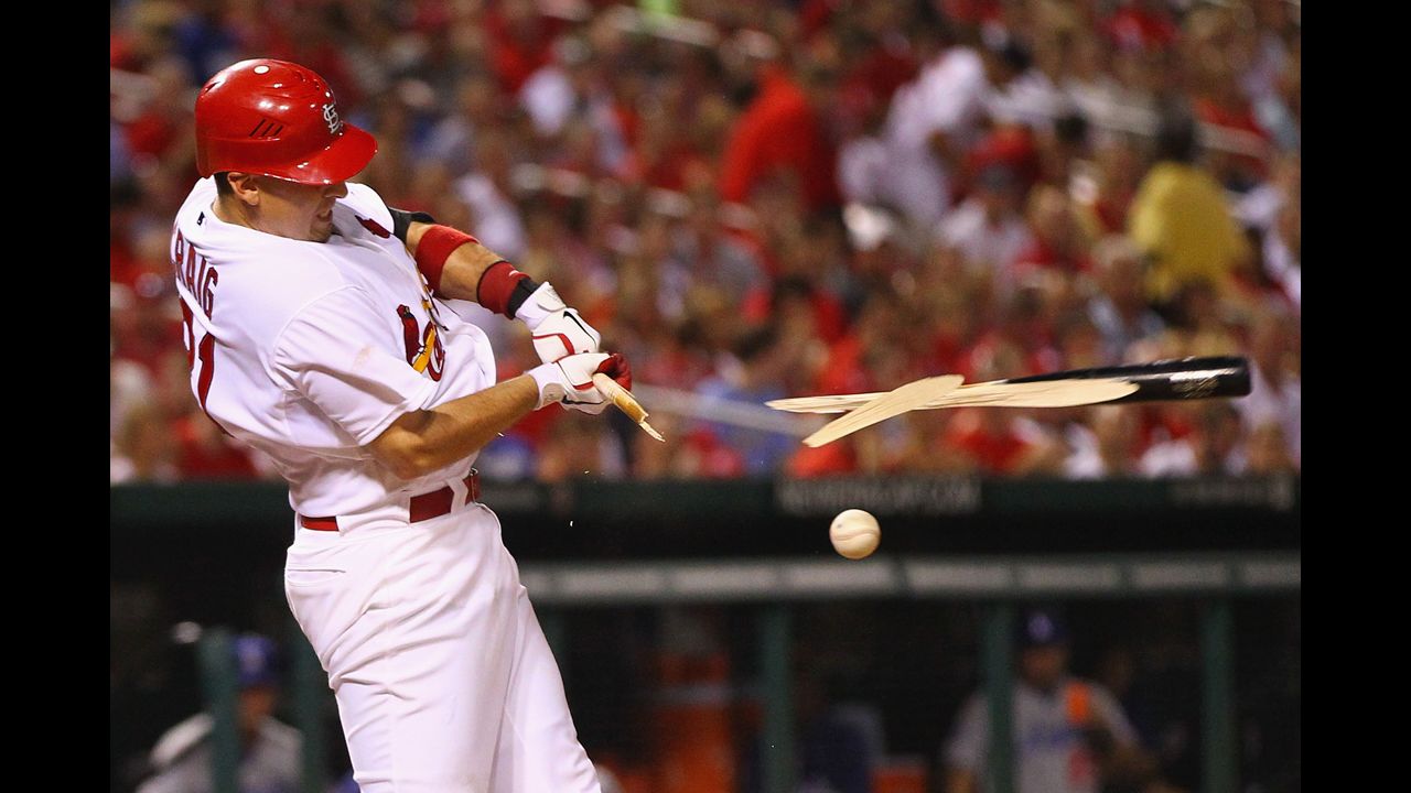 Allen Craig of the St. Louis Cardinals breaks his bat during a hit against the Los Angeles Dodgers on July 24 at Busch Stadium in St. Louis, Missouri.