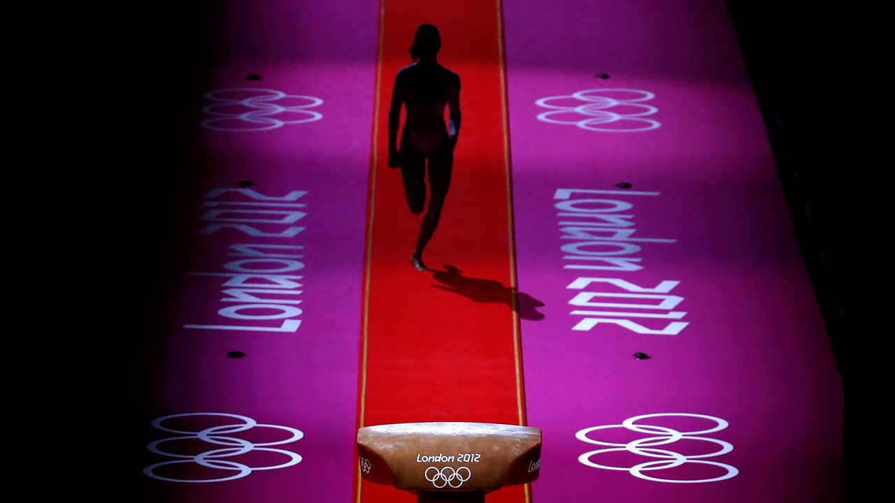 A gymnast performs during warmups before the start of the artistic gymnastics women's team final on Day 4 of the London 2012 Olympic Games on July 31 in London.