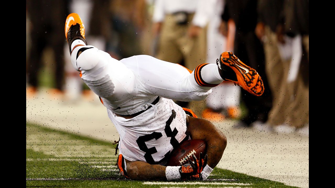 Running back Trent Richardson of the Cleveland Browns hits the ground hard after a play against the Baltimore Ravens on September 27 in Baltimore, Maryland.