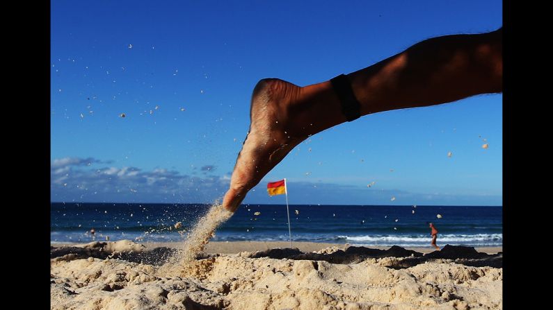 A competitor runs along the beach during the 2012 Bondi Barefoot Race at Bondi Beach on May 27 in Sydney, Australia.