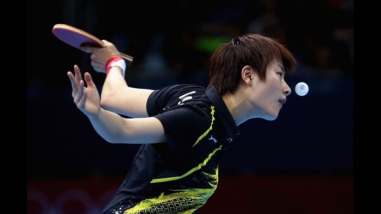 Ning Ding of China plays a forehand during the women's singles table tennis quarter-final match against Ai Fukuhara of Japan on Day 4 of the London 2012 Olympic Games on July 31.