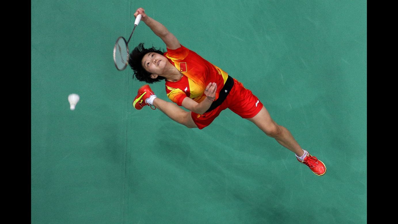 Xin Wang of China reaches for a shot hit by Xuerui Li of China in the women's singles badminton semi-final on Day 7 of the London 2012 Olympic Games on August 3.