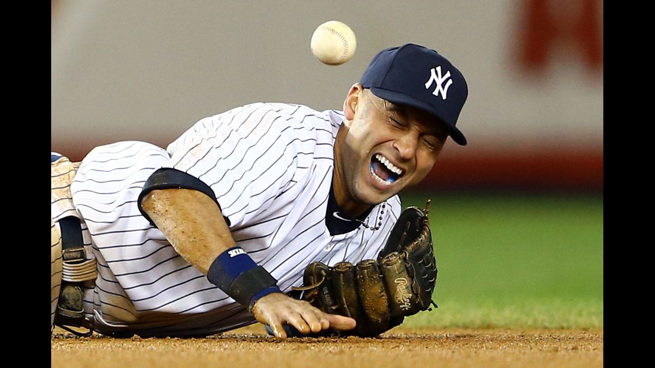 Derek Jeter of the New York Yankees injures his leg playing against the Detroit Tigers during Game 1 of the American League Championship Series at Yankee Stadium on October 13.