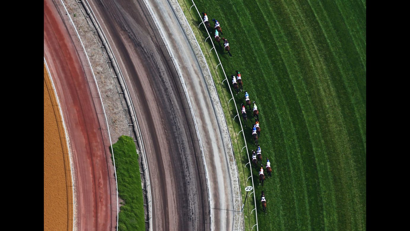 Riders race in the AAMI Victoria Derby during Victorian Derby Day at Flemington Racecourse on November 3 in Melbourne, Australia.
