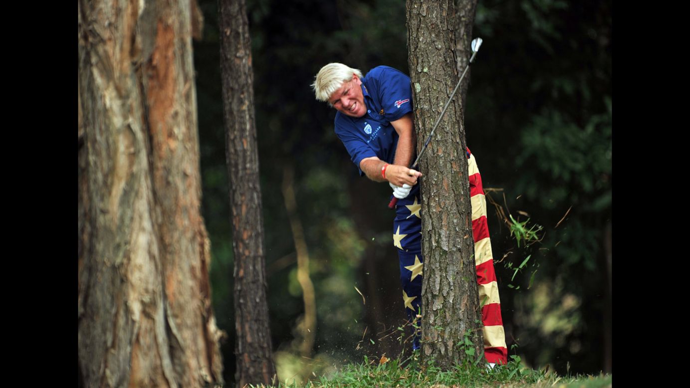 John Daly of the United States plays a shot from the trees during the first round of the UBS Hong Kong Open on November 15.