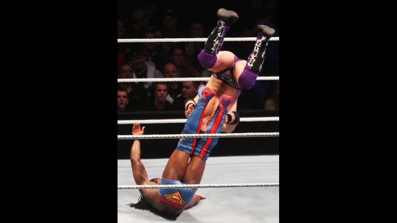 Kofi Kingston, bottom left, competes in the ring against The Miz during the WWE SmackDown World Tour on November 2 in Hamburg, Germany.