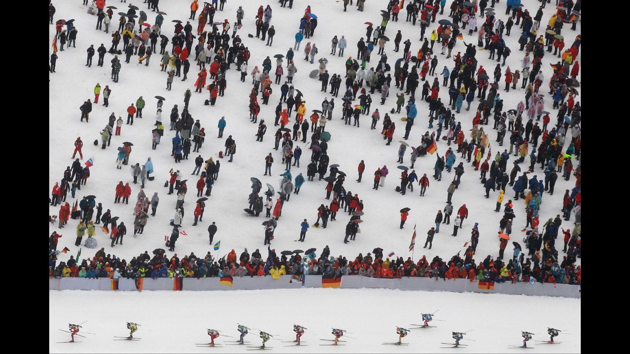 Athletes compete in the Men's 15-kilometer mass start during the IBU Biathlon World Championships at Chiemgau Arena on March 11 in Ruhpolding, Germany.  