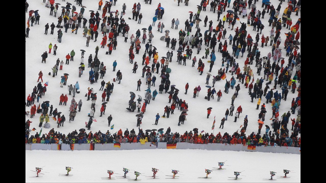Athletes compete in the Men's 15-kilometer mass start during the IBU Biathlon World Championships at Chiemgau Arena on March 11 in Ruhpolding, Germany.
