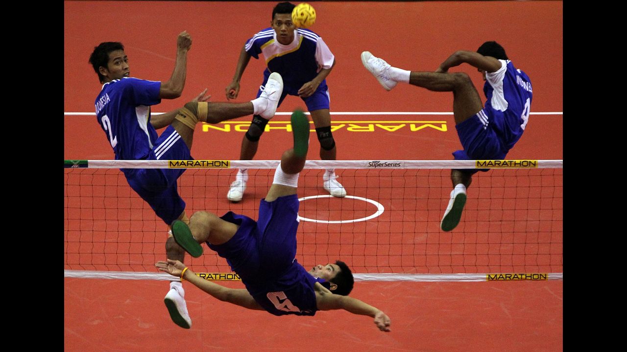 Thailand's Kaokaew Pornchai returns a shot to Indonesia's team in the men's kick volleyball semifinal during Day 3 of the ISTAF Super Series on February 25 in Palembang, Indonesia.