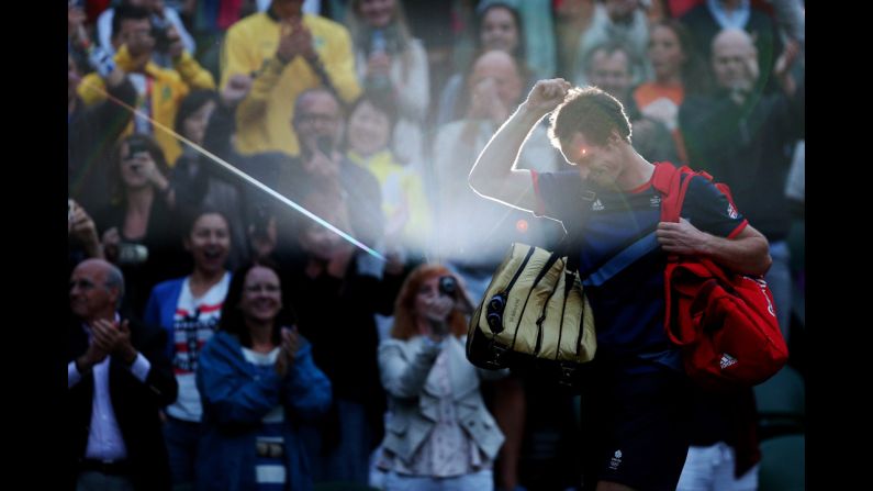 Andy Murray of Great Britain celebrates his 7-5, 7-5 win against Novak Djokovic of Serbia in the semifinal of men's singles tennis on Day 7 of the London 2012 Olympic Games on August 3 in London.