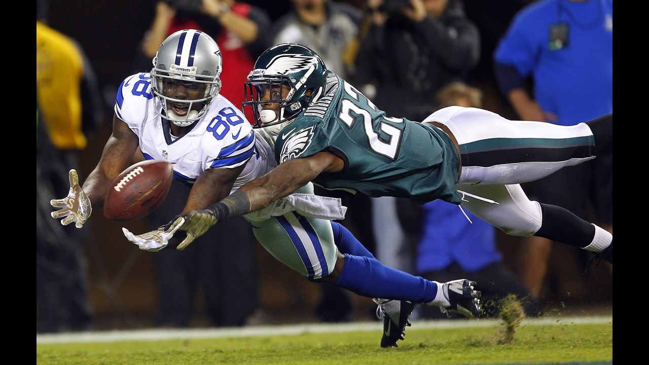Dez Bryant of the Dallas Cowboys dives to makes a catch for a 30-yard touchdown as Dominique Rodgers-Cromartie of the Philadelphia Eagles defends on November 11 in Philadelphia. The Cowboys defeated the Eagles 38-23.