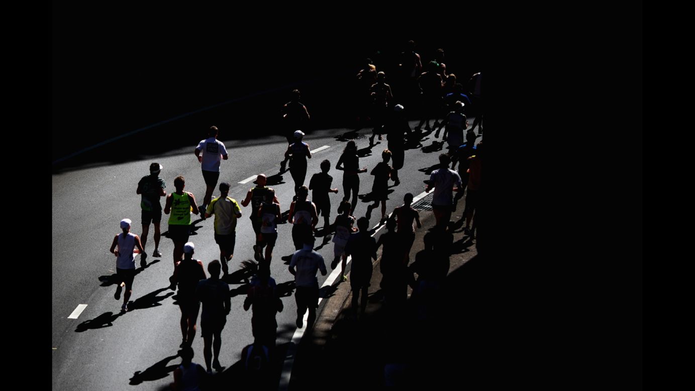 Competitors run under the Sydney Harbour Bridge during the Sydney Running Festival on September 16.