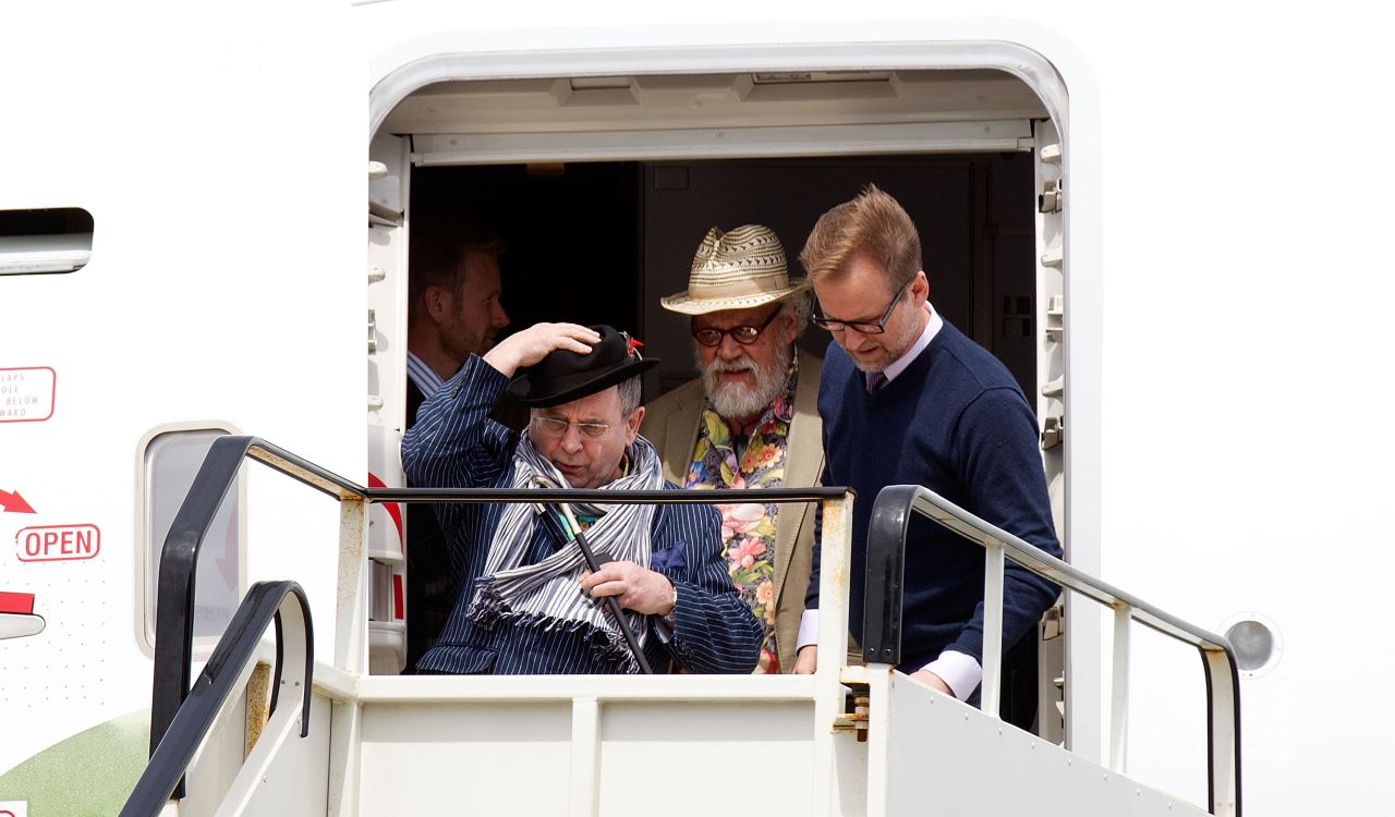 Cast members including Sylvester McCoy (hanging onto his hat) and John Callen arrive in the Middle of Middle Earth, as Wellington has been dubbed.